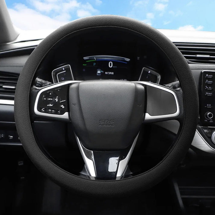 Liukumaton ohjauspyörän suojus